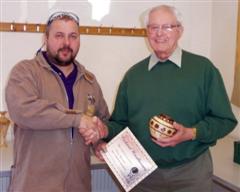 The monthly winner Frank Hayward received his certificate from Mick Hanbury
